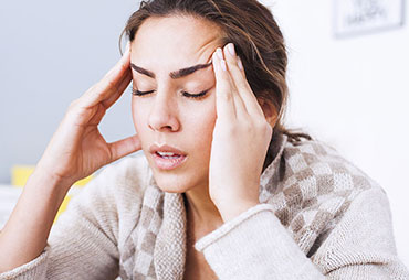 Woman with headache following an auto accident