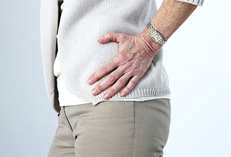 Go to hip and leg pain after an auto accident Woman suffering with hip and leg pain following an auto accident